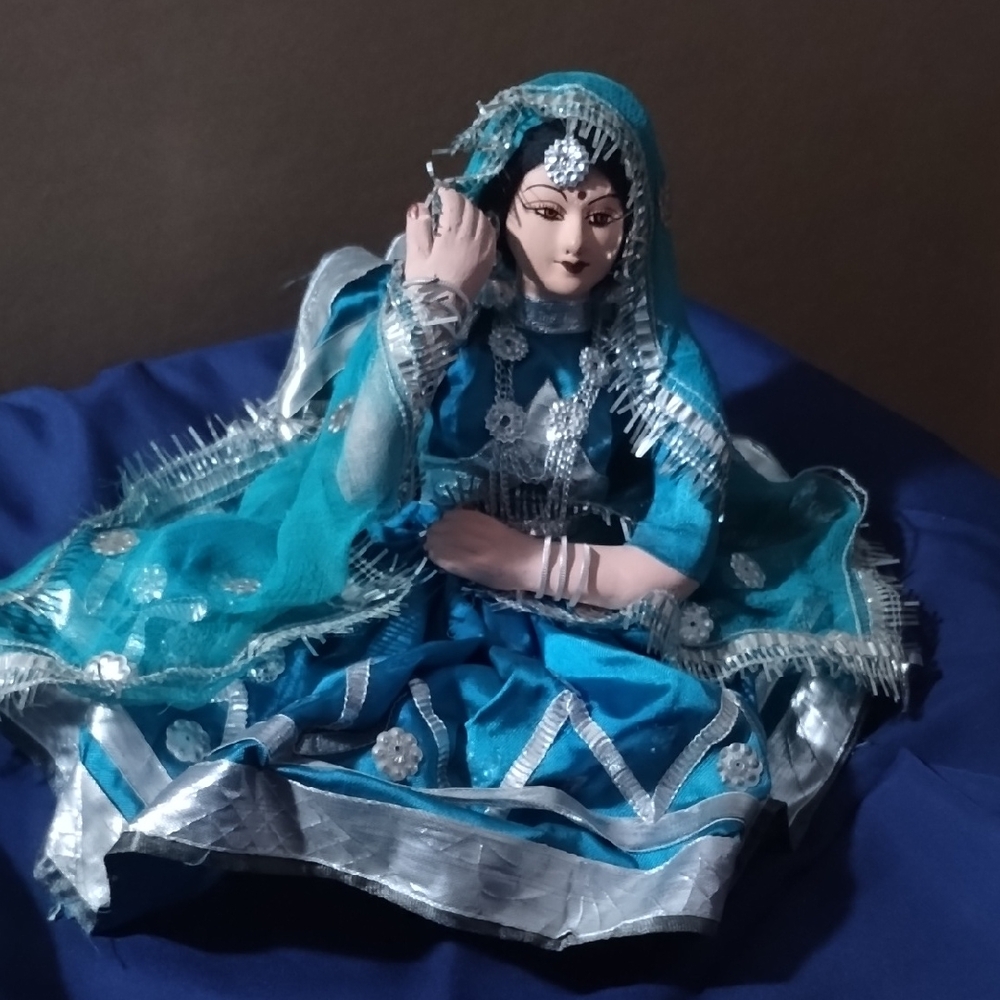 Elegant Blue and Silver Decorative Doll